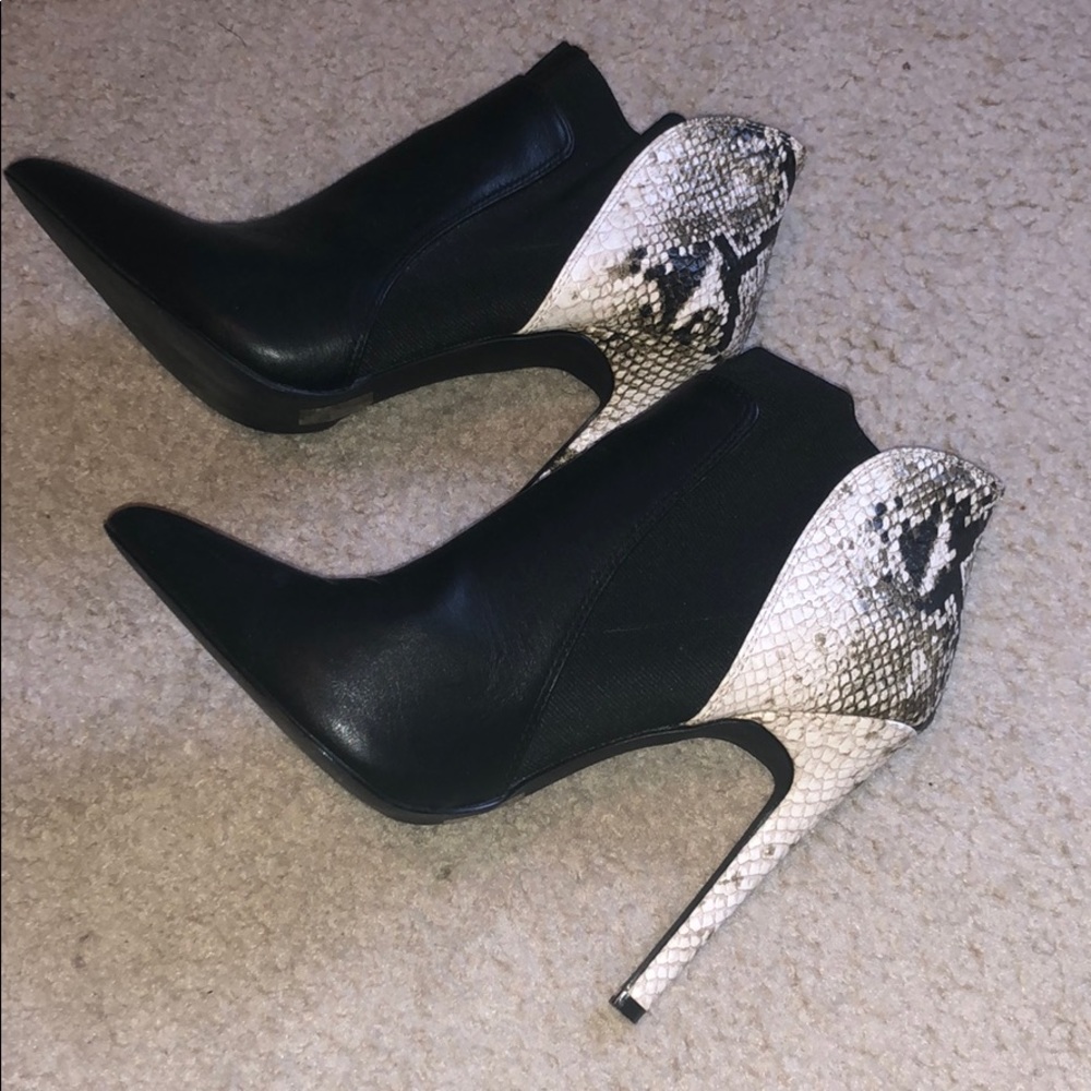 Black snake skin high heeled bootie shoes